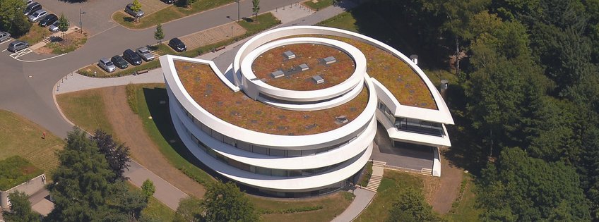 The HdA building in fall, seen from above. The galaxy-like plan of the building is clearly visible.