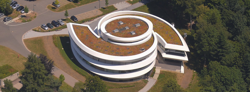 The HdA building in fall, seen from above. The galaxy-like plan of the building is clearly visible.