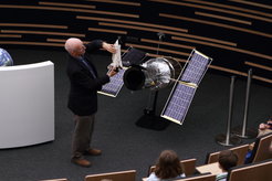 ESA astronaut Claude Nicollier explains one of his Hubble Space Telescope repair missions to elementary school students