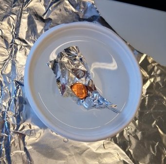 Abbildung 1: Münze auf Wasser Abbildung 1: Münze auf Wasser