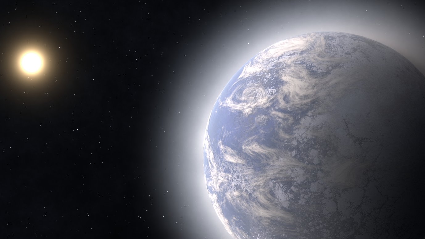 Künstlerische Darstellung eines Exoplaneten, der große Mengen an Wasser besitzt und eine dichteAtmosphäre ausbildet.